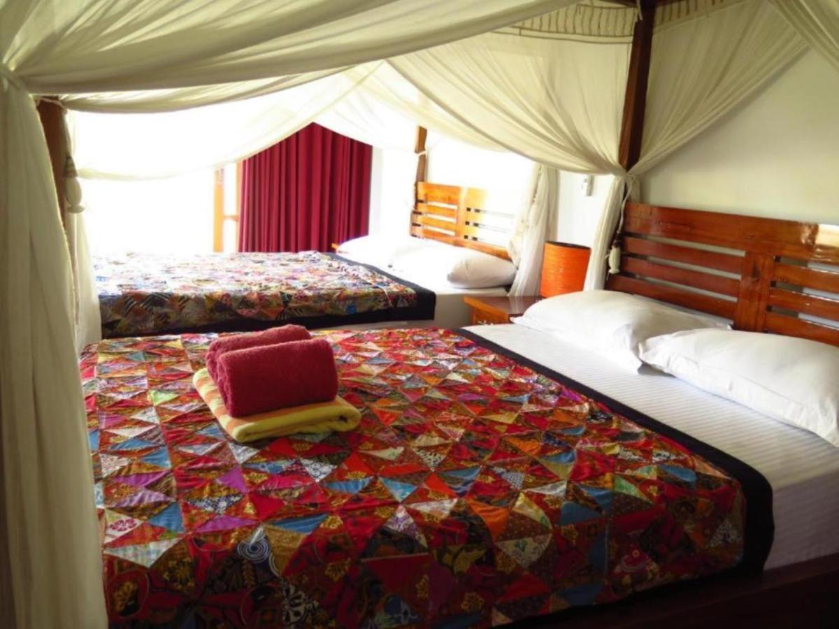 Sunia Loka Bungalows & Dive Center เปมูเตรัน ภายนอก รูปภาพ